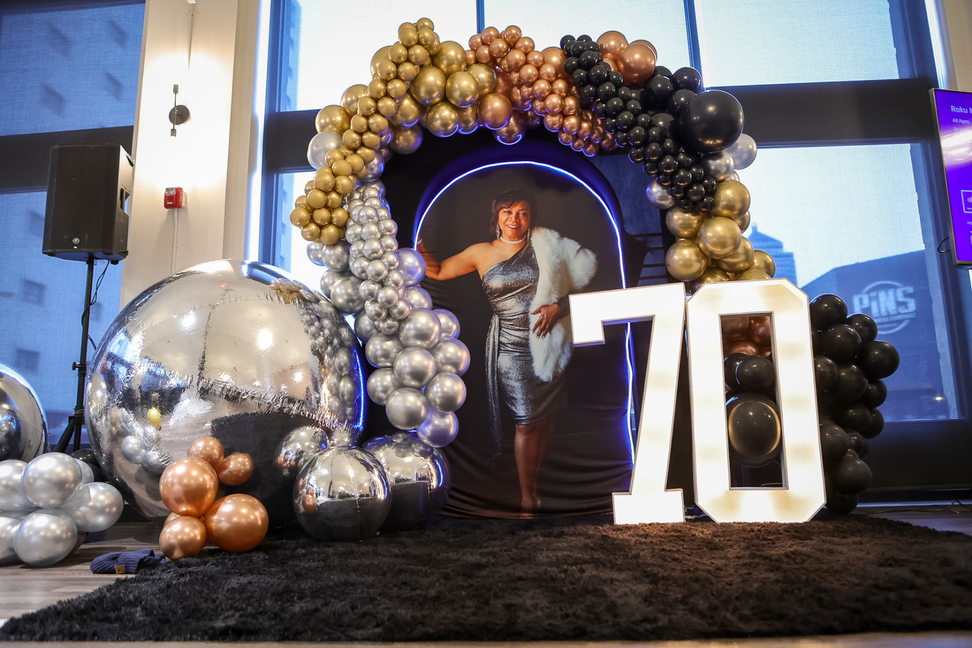 Lit marquee numbers framed by a balloon arch — Event Rentals & Furnishings by Good Time Mascots in Columbus, Ohio