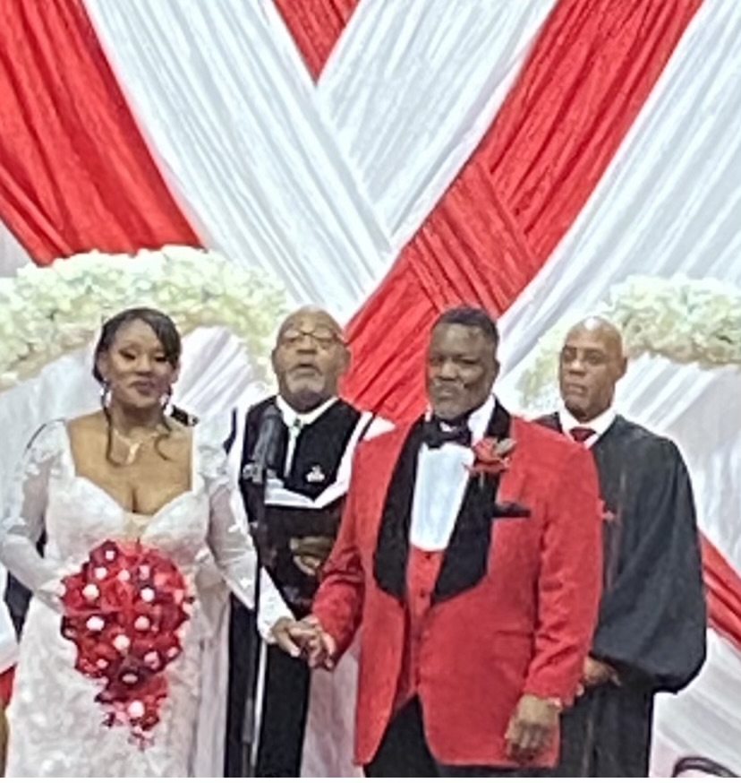 Red and white ceremony backdrop at the altar — Weddings by Good Time Mascots in Columbus, Ohio