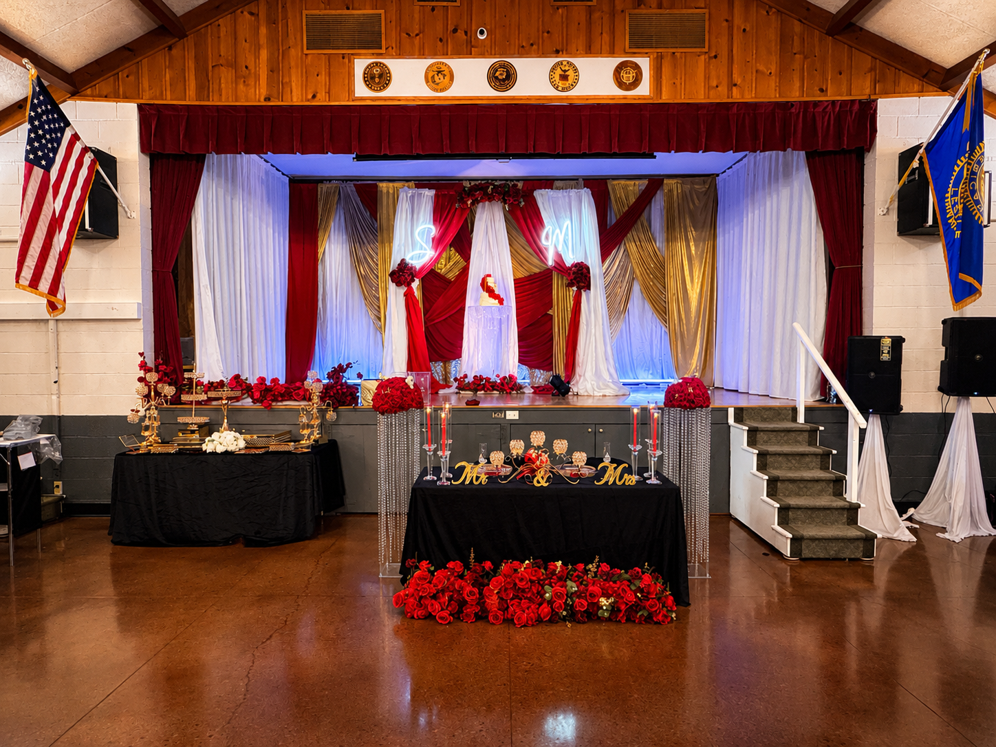 Sweetheart table and stage dressed in crimson, gold and ivory — Weddings by Good Time Mascots in Columbus, Ohio