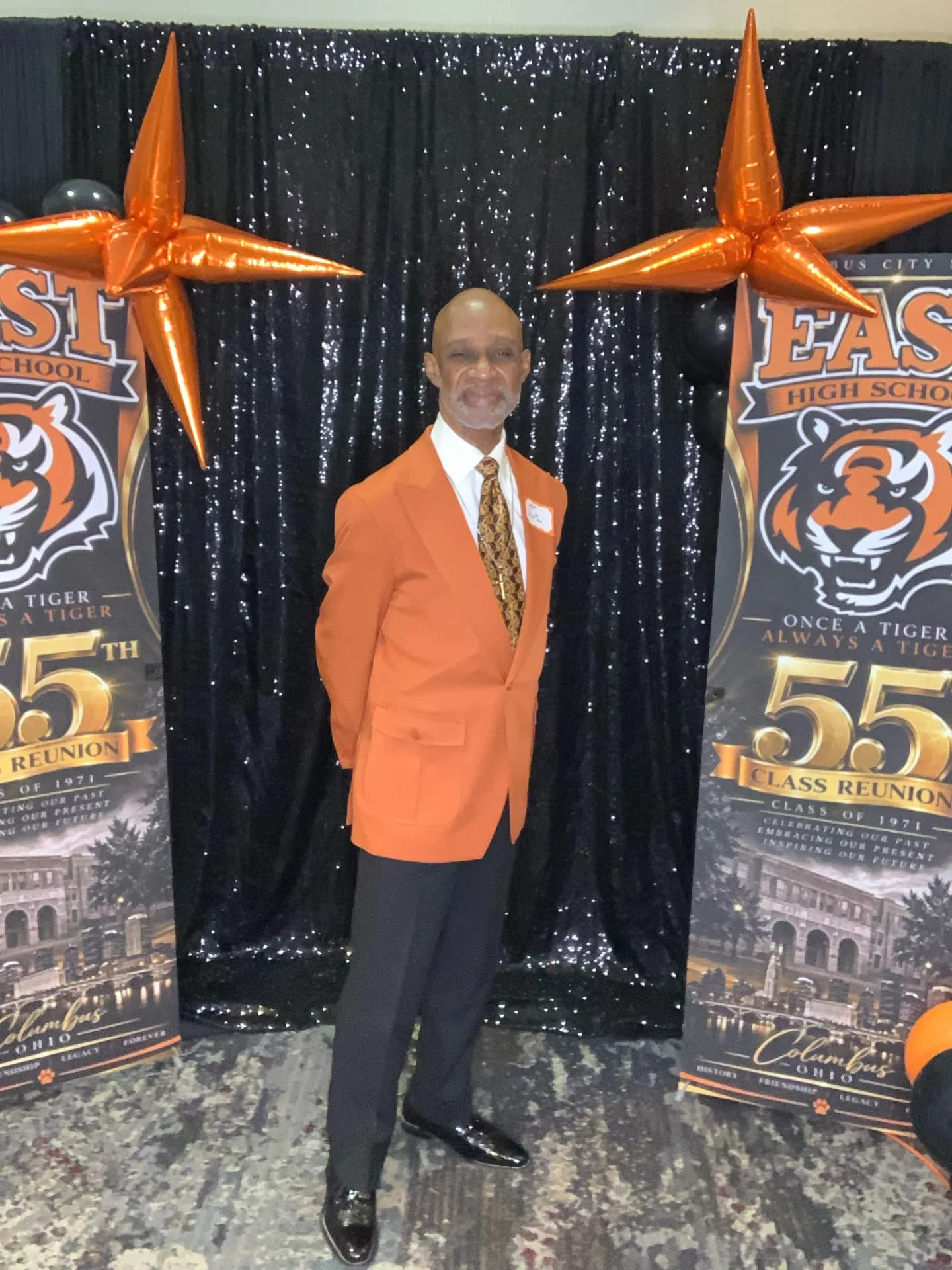 Open-air photo booth setup with custom reunion banners, sequin backdrop and balloon columns — Photo Booth & 360 Experiences by Good Time Mascots in Columbus, Ohio